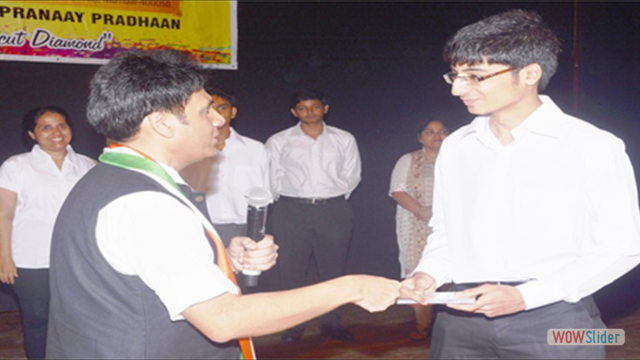 Student Mr.Romil Golani receiving 'Best Student of Year Award'
