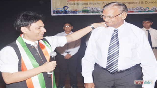 Mr.Gautam Garry Guptaa addressing Mr.K.Narayanan(Sr.Student)