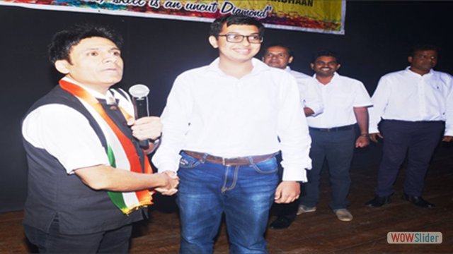 Student Mr.Karan Dharamshil Handshaking with Mr.Gautam Garry Guptaa