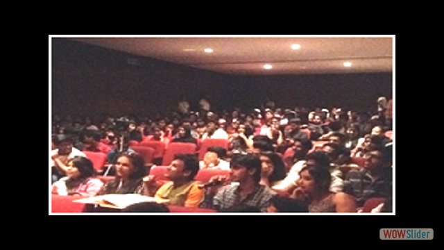 Gautam Garry Guptaa very attentivly listening to the answer of the participant with the other fellow judge